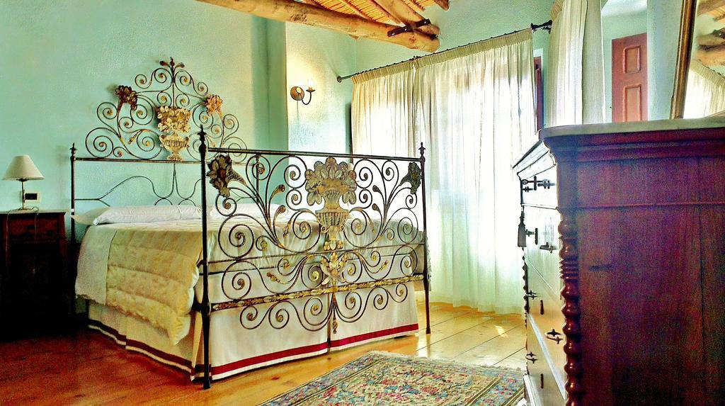 Il Borgo Dell'Arcangelo Tuili Habitación foto